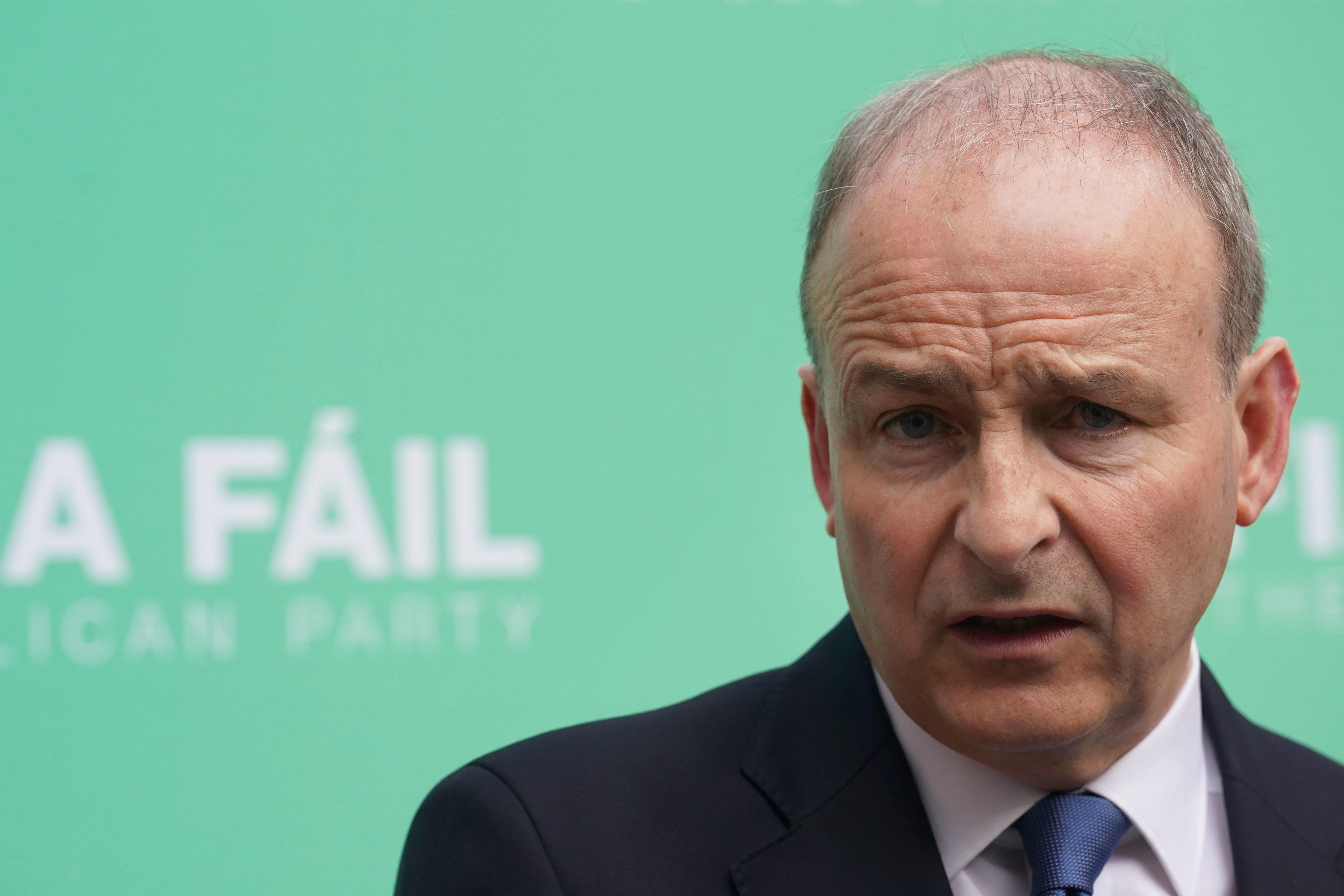 Tanaiste Micheal Martin speaks to the media (PA)