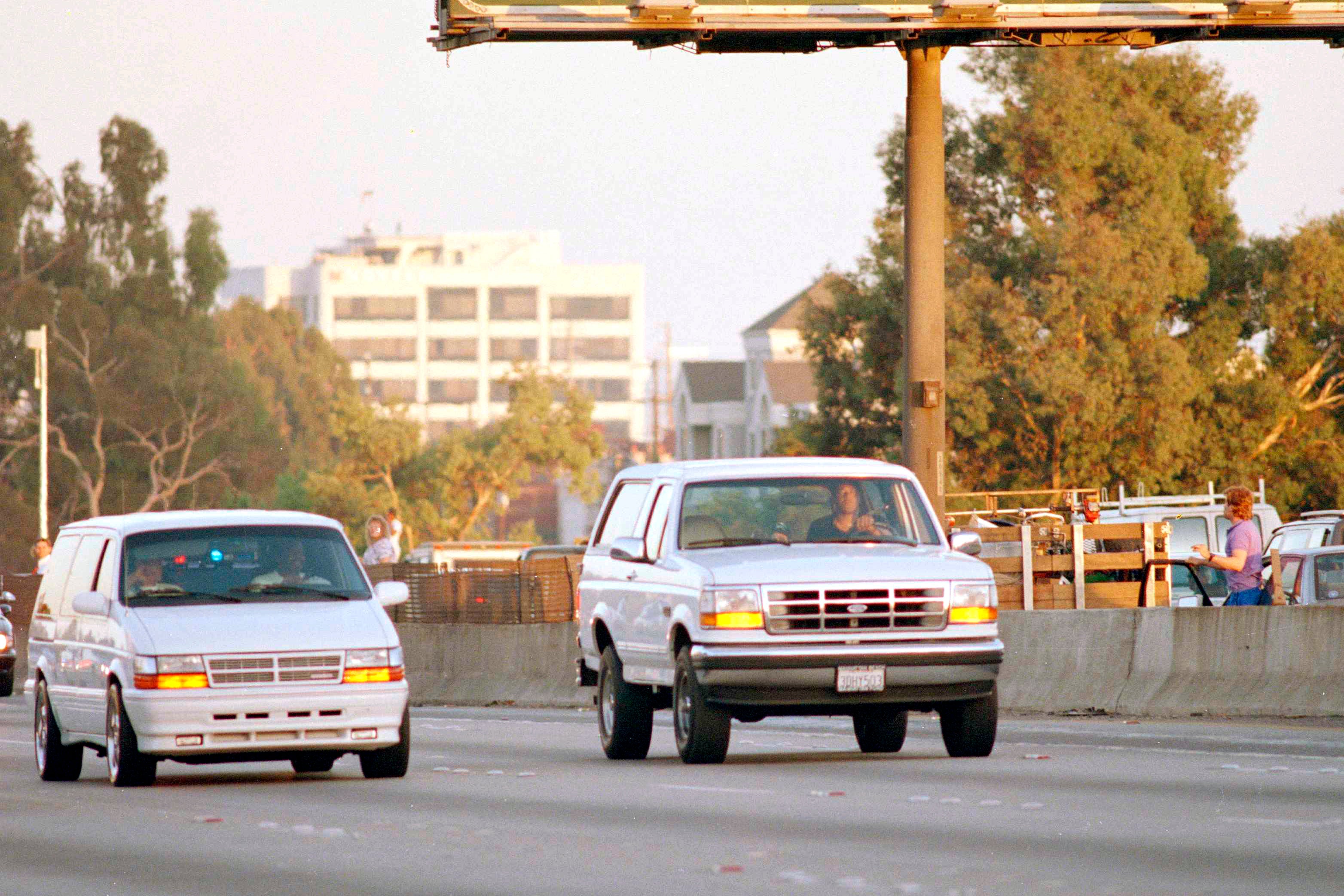 Al Cowlings, with OJ Simpson hiding, drives a white Ford Bronco as they lead police on a two-county chase along the northbound 405 Freeway towards Simpson’s home, June 17, 1994, in Los Angeles