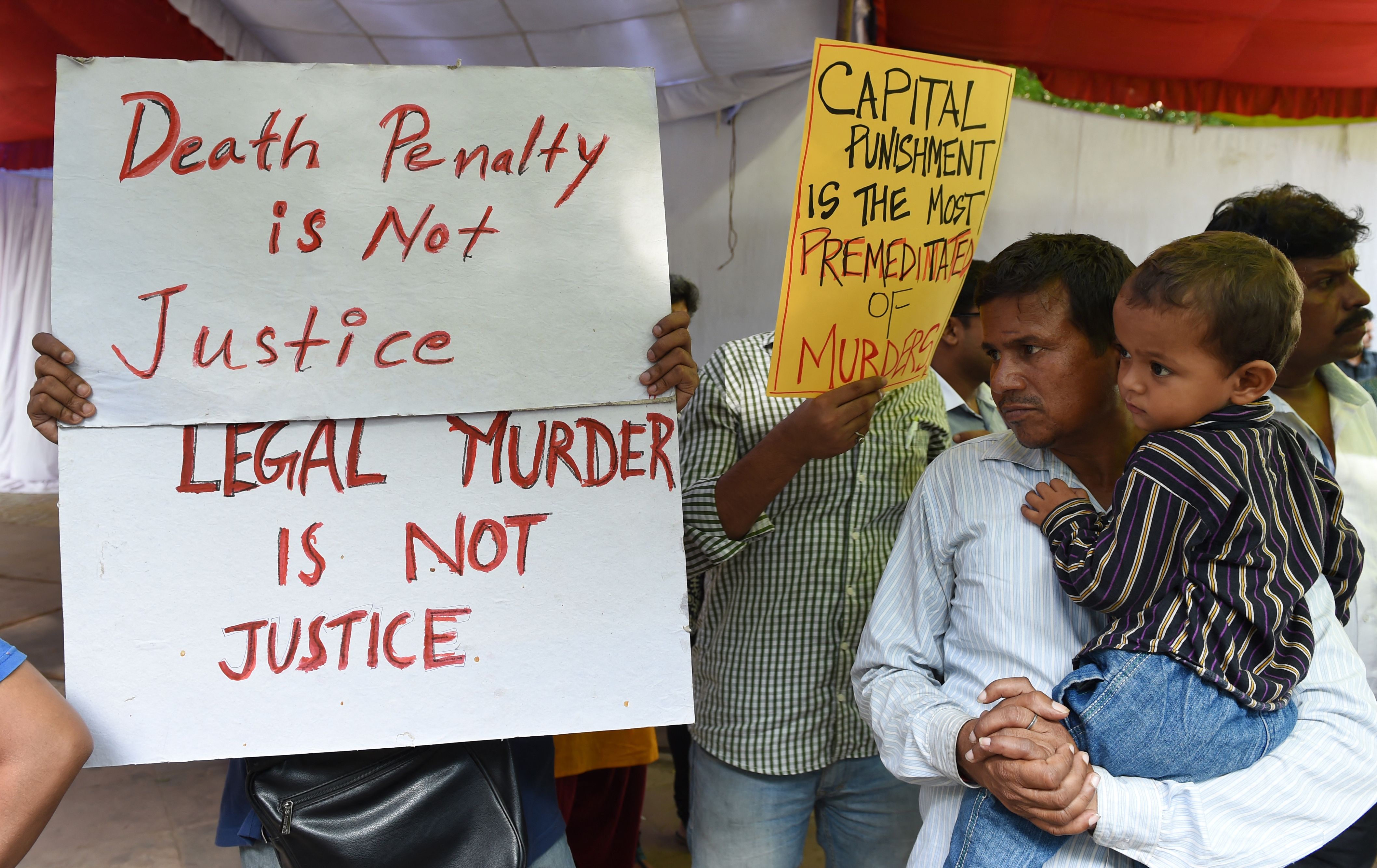 Indian activists during a protest against capital punishment in New Delhi on 30 July 2015