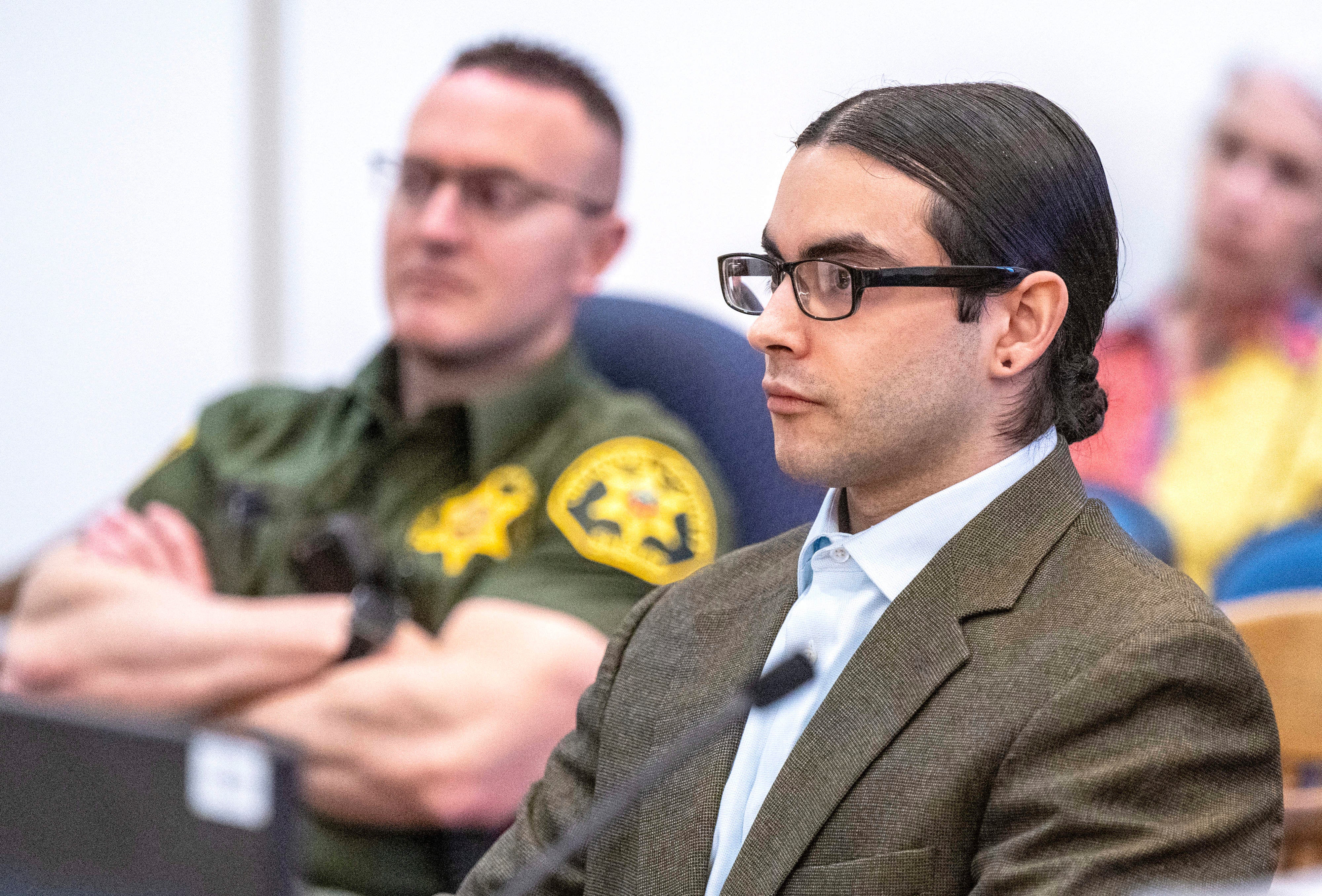 Marcus Eriz, pictured at his Friday sentencing, will spend at least 40 years in prison after killing six-year-old Aiden Leos