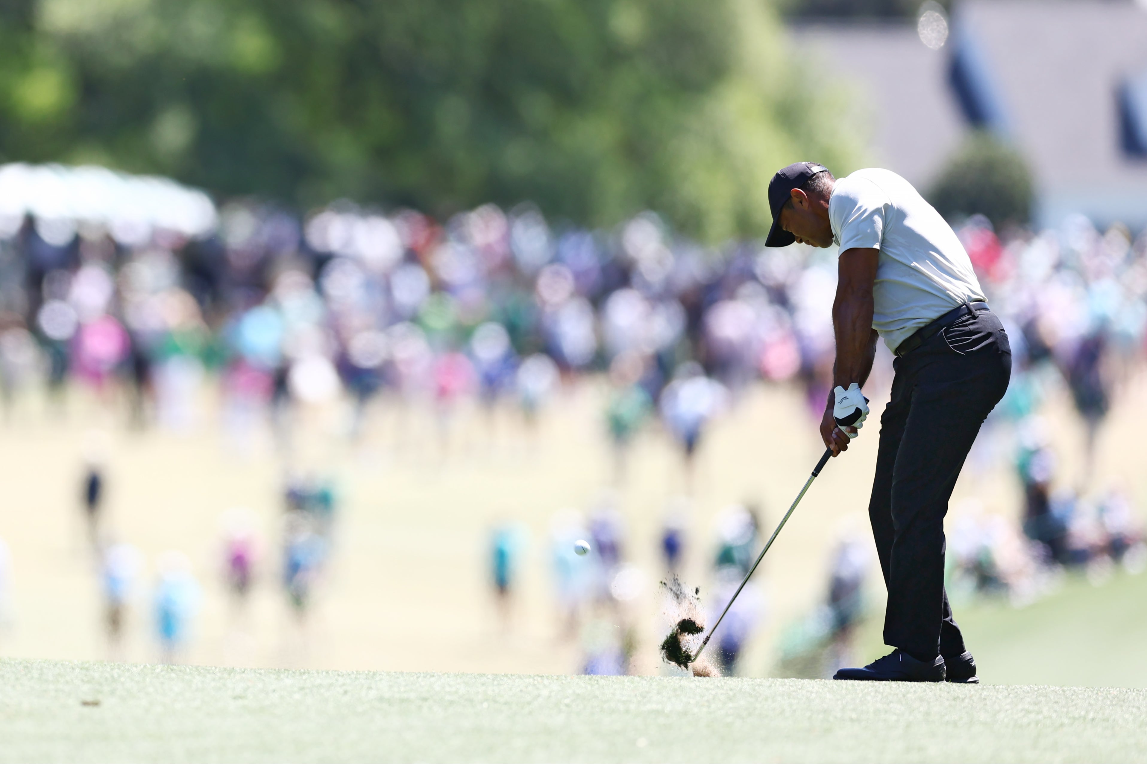 Tiger Woods slipped down the field on moving day