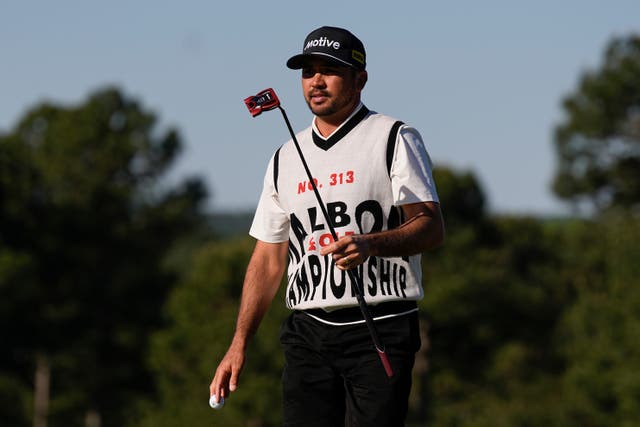 Jason Day wore the sleeveless jumper on the first day at Augusta (George Walker IV/AP)