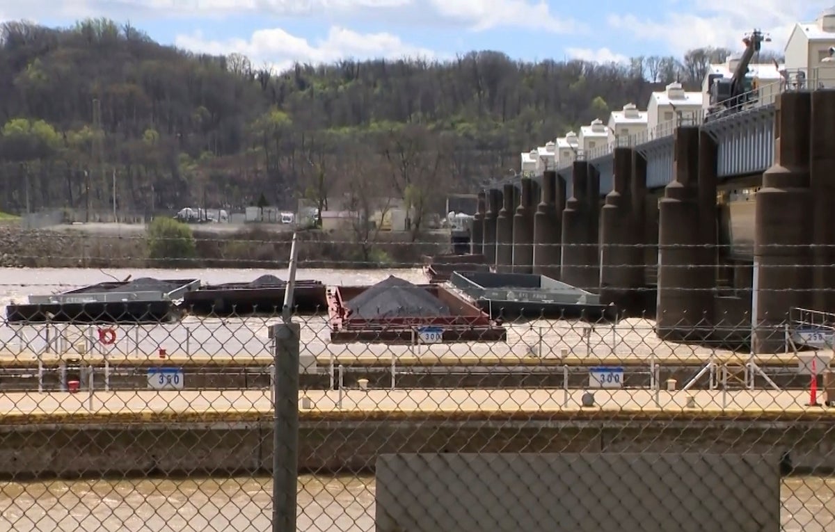 Ohio River near Pittsburgh is closed as crews search for missing barge, one of 26 that broke loose