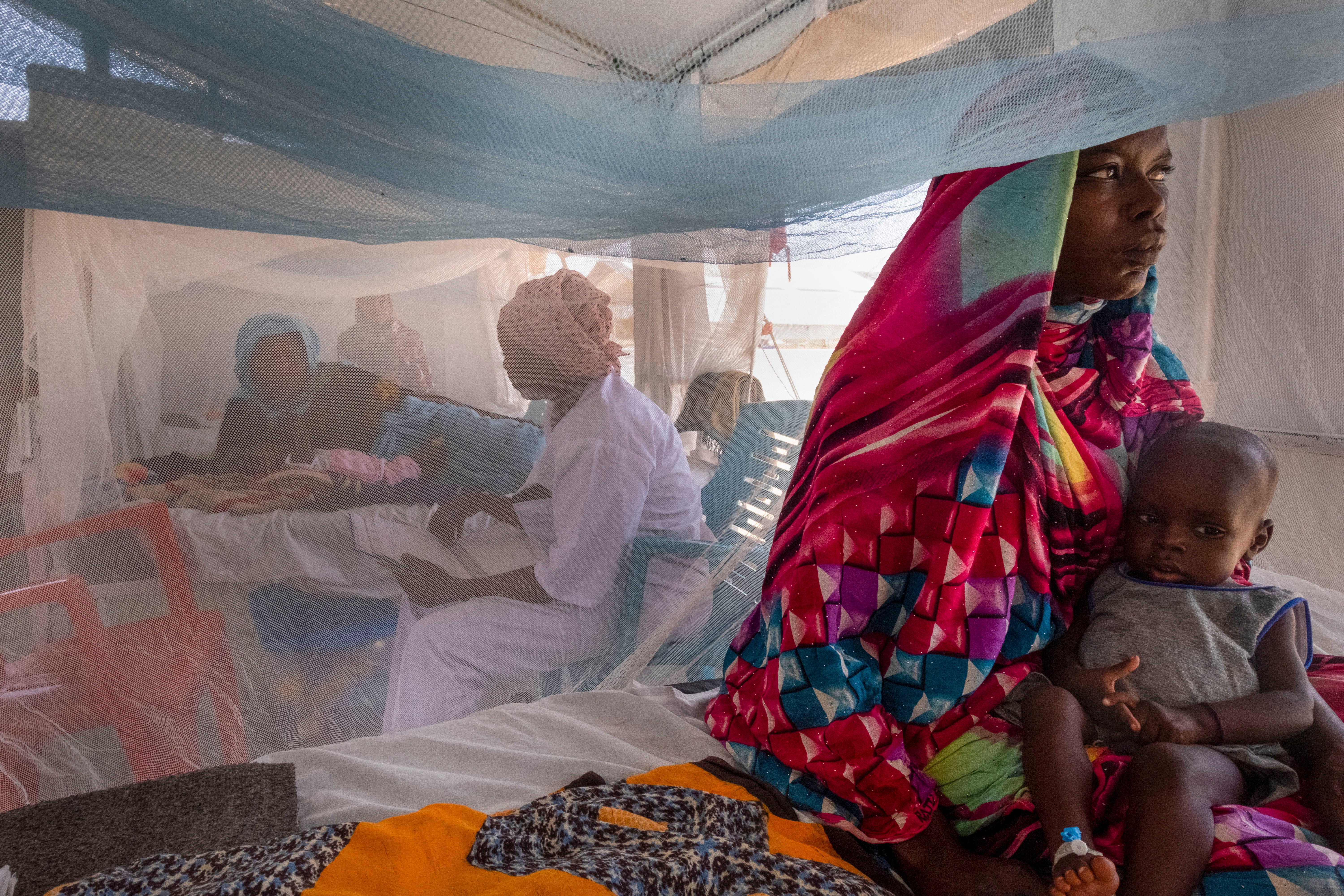 Sudanese children suffering from malnutrition are treated at a Medicins Sans Frontieres clinic in Metche Camp, Chad