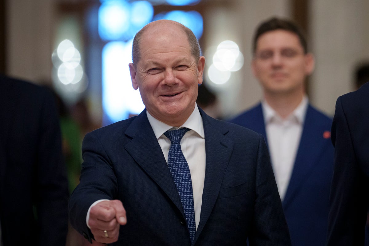 Germany's Scholz arrives in China on a visit marked by trade tensions and Ukraine conflict