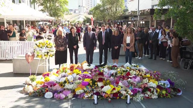 <p>Australian prime minister lays flowers outside scene of Sydney stabbings.</p>