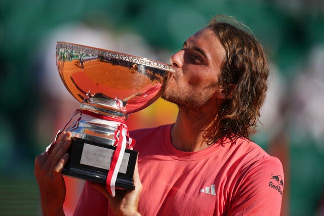 Stefanos Tsitsipas with the trophy after his Monte-Carlo Masters final victory over Casper Ruud (Daniel Cole/AP)