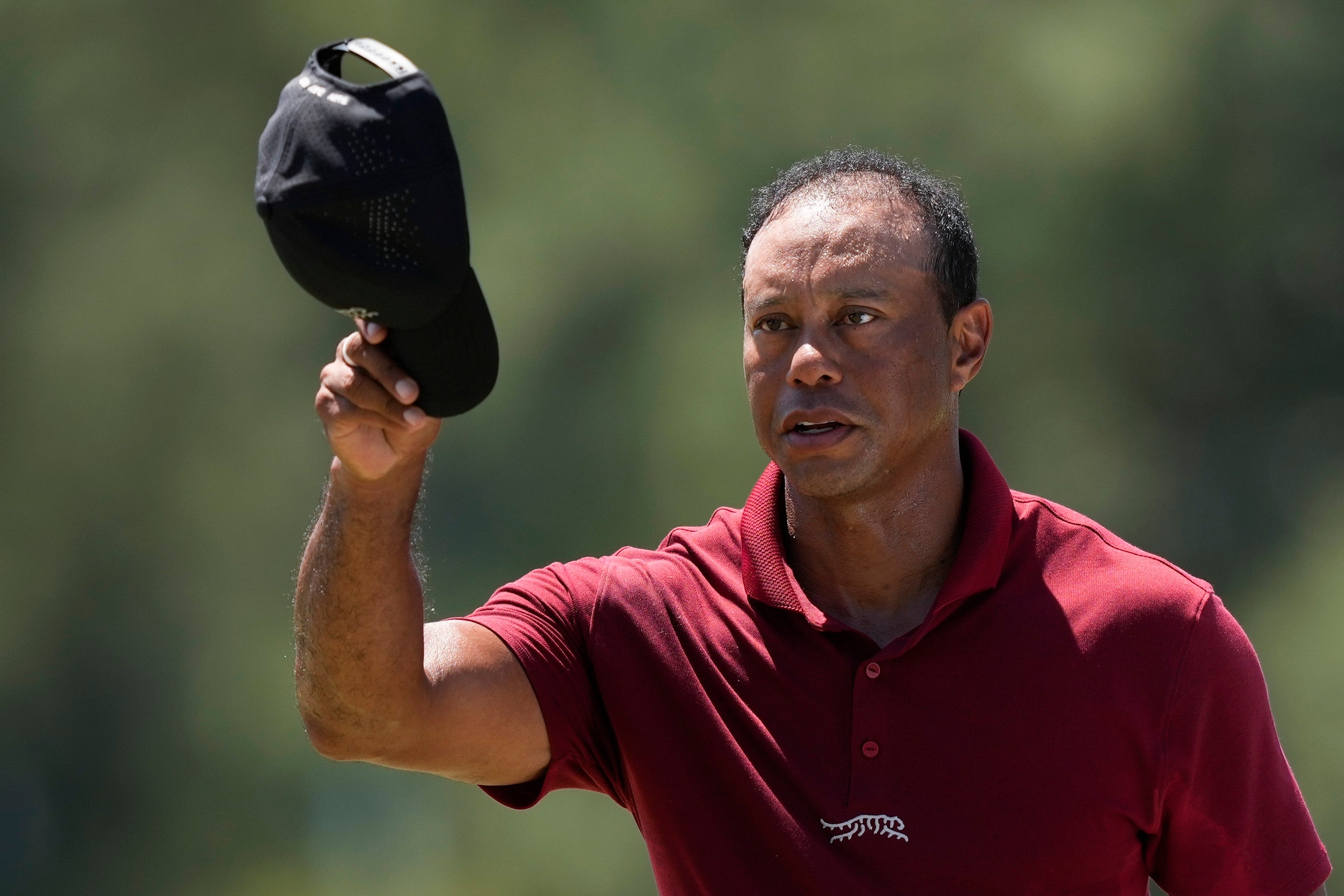 Tiger Woods waves after his final round at the Masters golf tournament at Augusta National Golf Club in April 2024