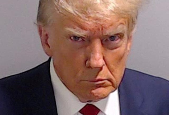 <p>Donald Trump said that he has received more support from the Black and Hispanic communities after he took his mugshot, pictured, in Fulton County, Georgia </p>