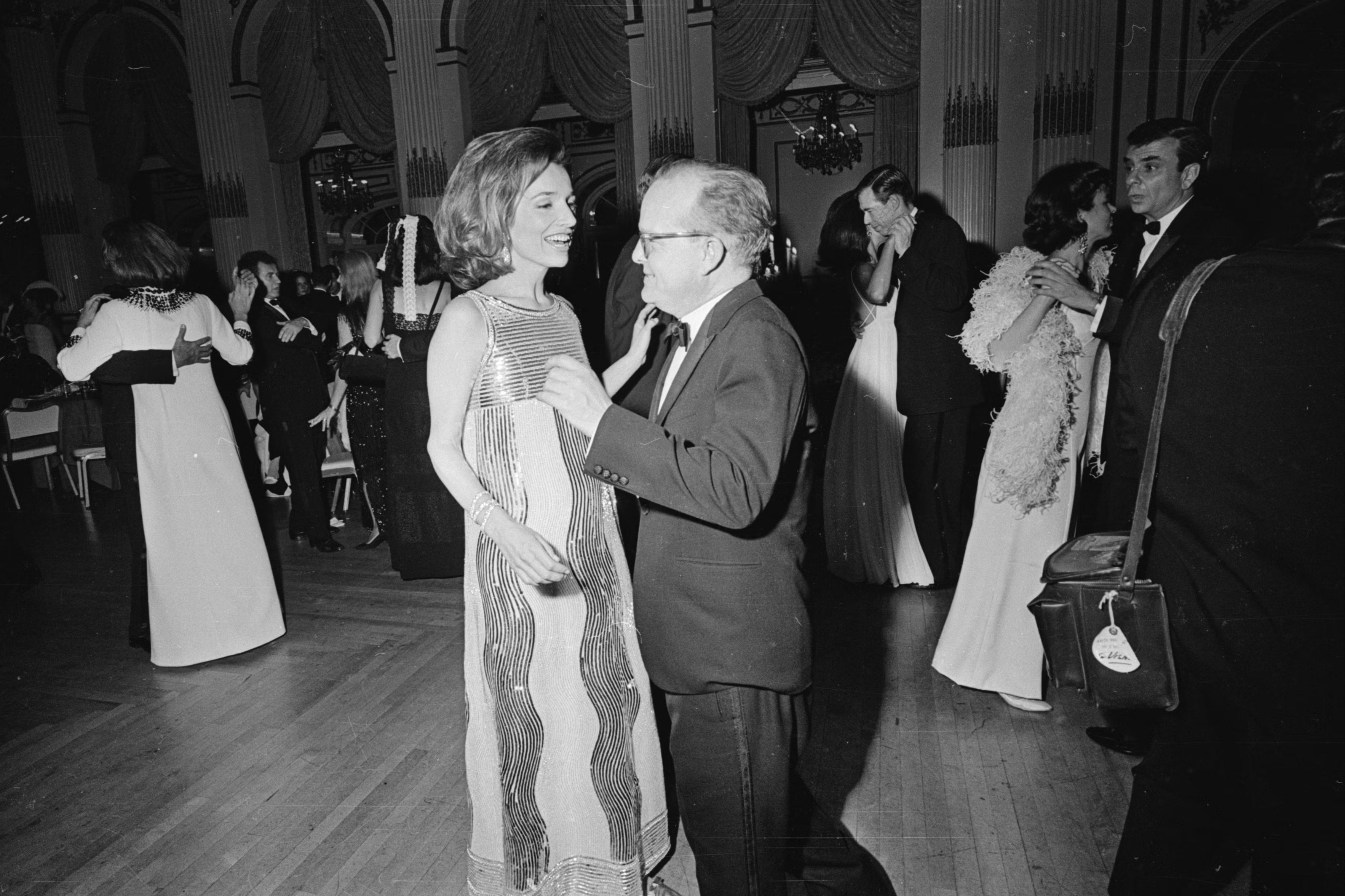 Dazzling: Lee Radziwill dances with Truman Capote at the Black and White Ball, hosted by the author in 1966