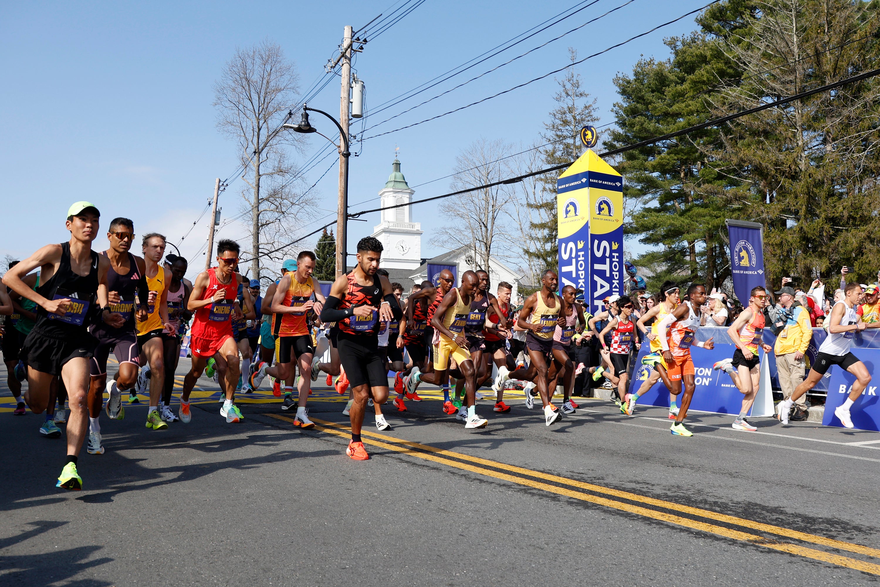 Elite male runners break from the start line of the Boston Marathon, Monday, April 15, 2024, in Hopkinton, Massachussetts. Survivors of the 2013 Boston bombings will be honored at this year’s marathon