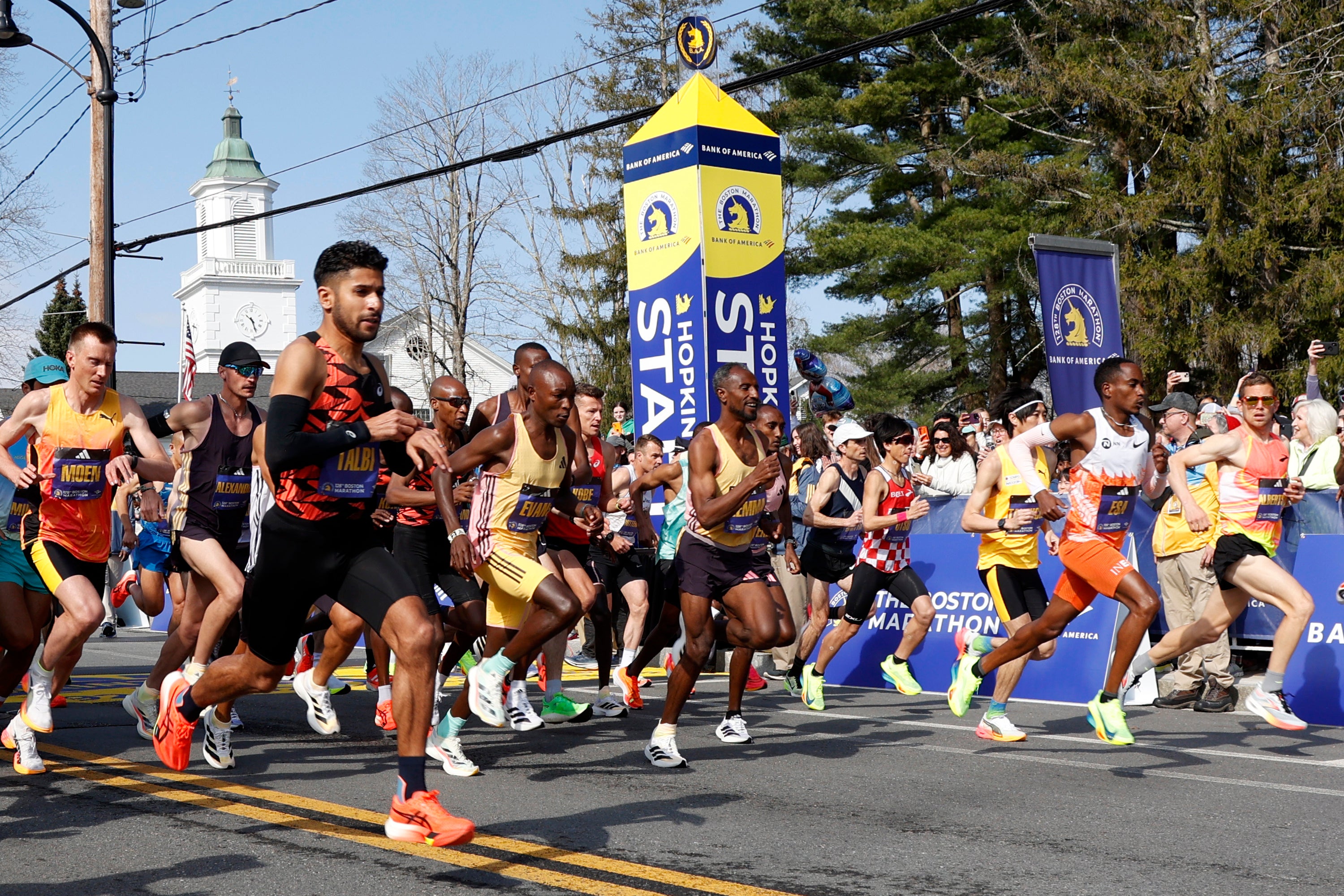 Elite male runners break from the start line of the Boston Marathon, Monday, April 15, 2024, in Hopkinton, Massachussetts