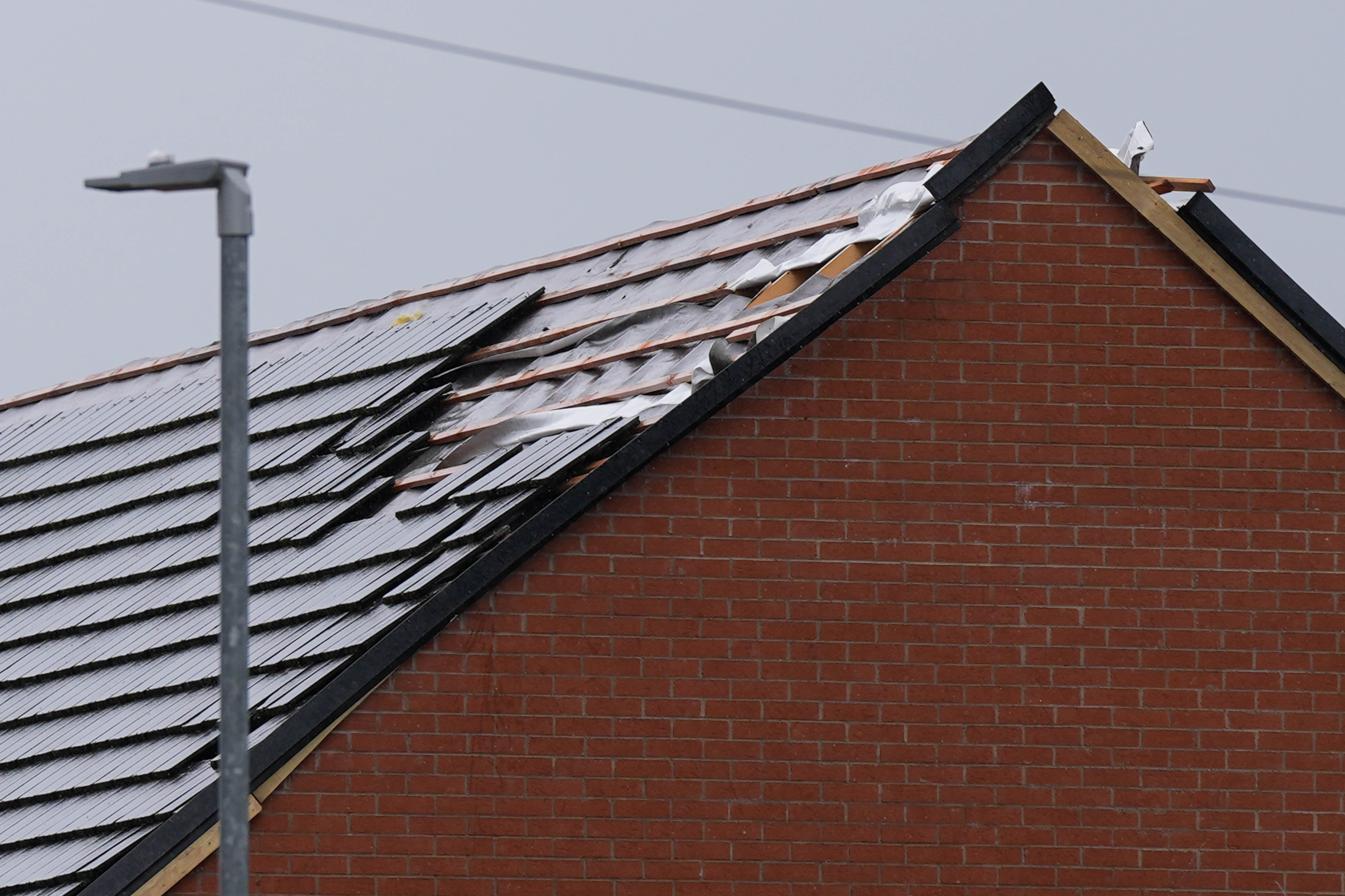 Missing tiles from a roof on St Gile’s Road in Knutton, Staffordshire, where high winds caused damage in the early hours of the morning