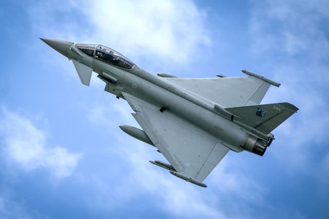 <p>Two Typhoons were scrambled into the air from RAF Lossiemouth in Scotland after the Russian aircraft was detected </p>