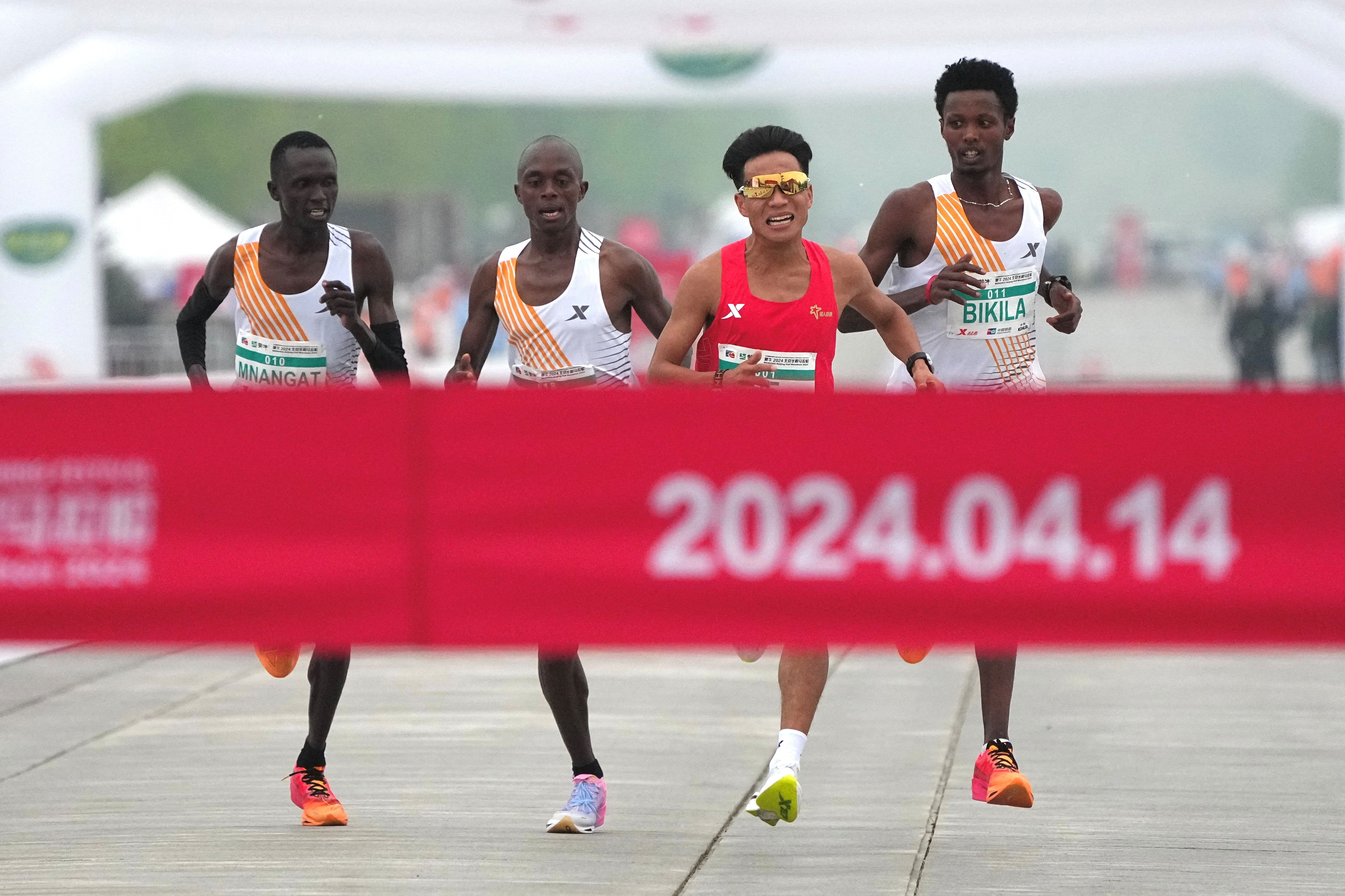 The Chinese runner crossed the line first, and then the uproar began