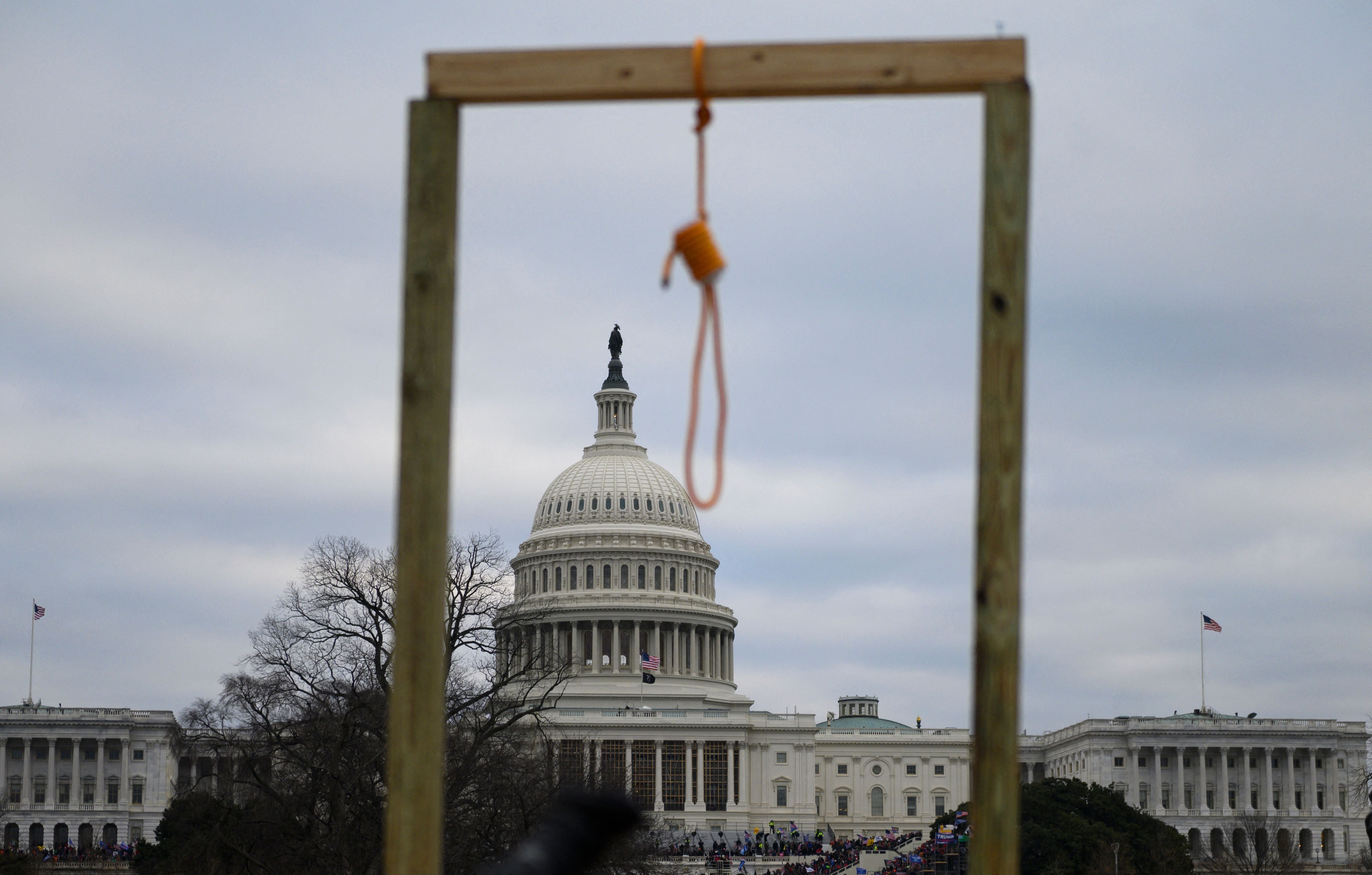 A noose is seen on makeshift gallows as supporters of President Donald Trump gather on the west side of the US Capitol in Washington DC on January 6, 2021