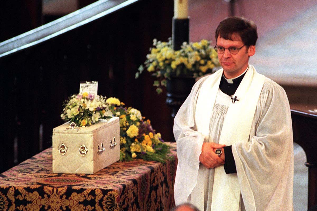 The Rev Mark Chilcott conducts the service for baby Callum in St Elphin’s Church, Warrington, in 1998 (PA)