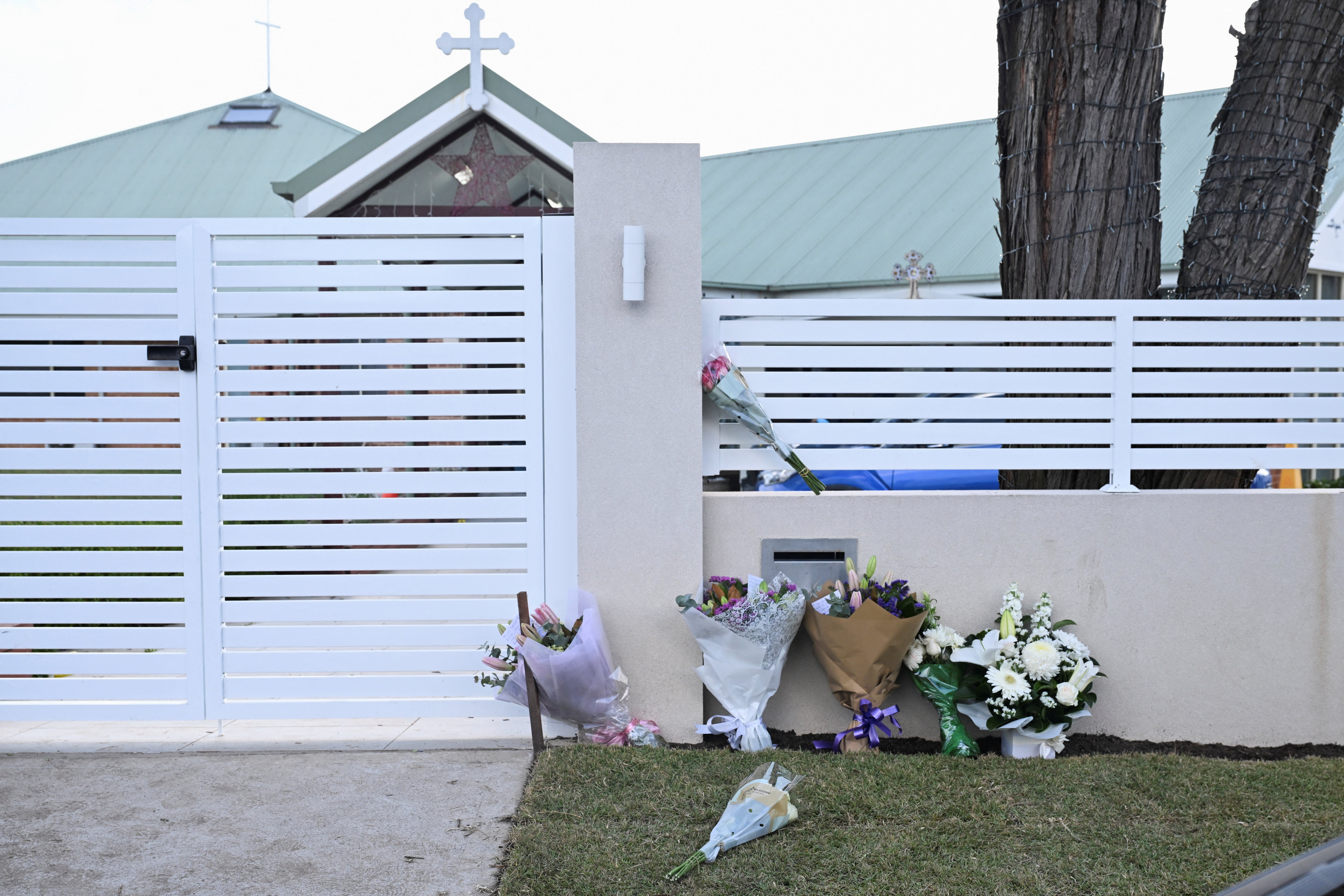 Flowers laid outside the Christ The Good Shepherd Church after the bishop was stabbed duirng a service on Monday