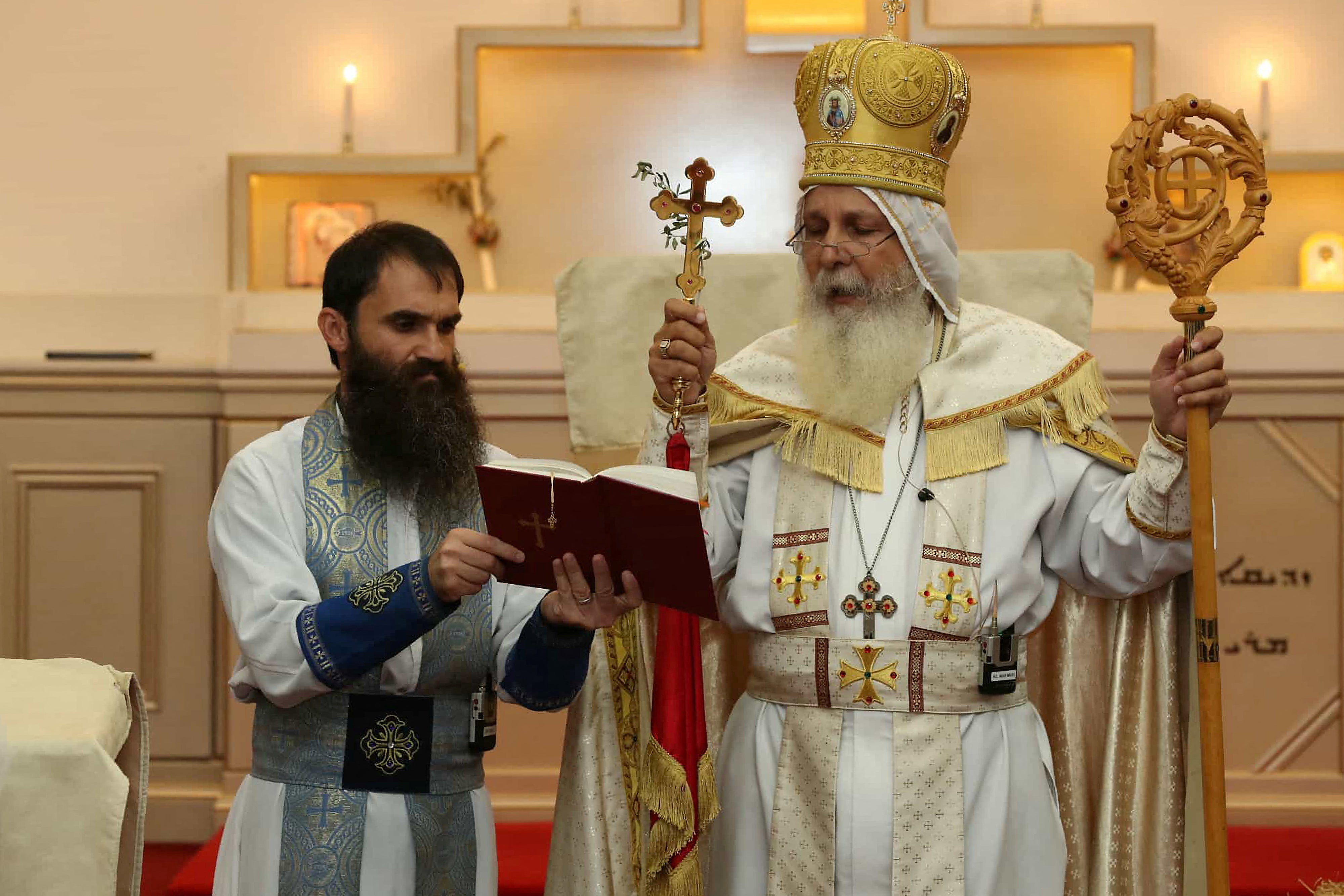 Senior Parish Priest Isaac Royel (L) and Bishop Mar Mari Emmanuel during the 2023 Holy Resurrection Feast services, in Sydney, Australia