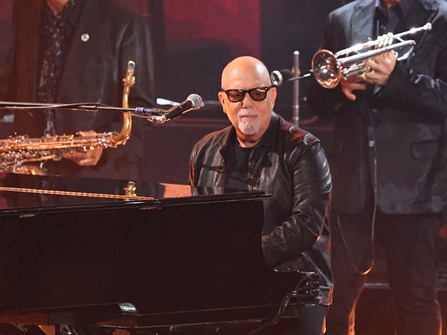 <p>Billy Joel performing at the Grammys</p>