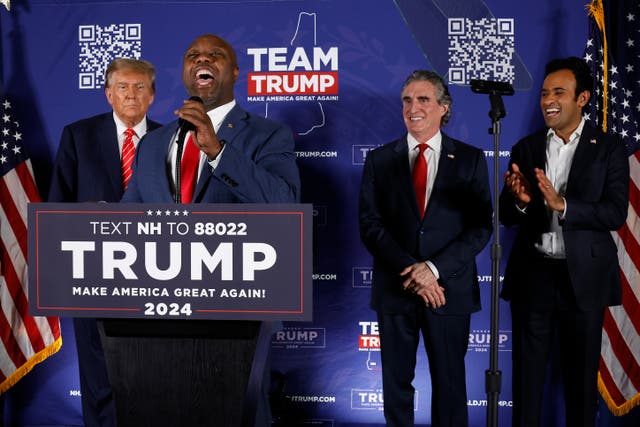 <p>Tim Scott appears at a rally for Donald Trump in early 2024 flanked by other potential VP picks, Doug Burgum and Vivek Ramaswamy </p>