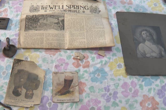 <p>Twelve artifacts were found in a time capsule from 1915 in a Grand Rapids, Michigan, home</p>