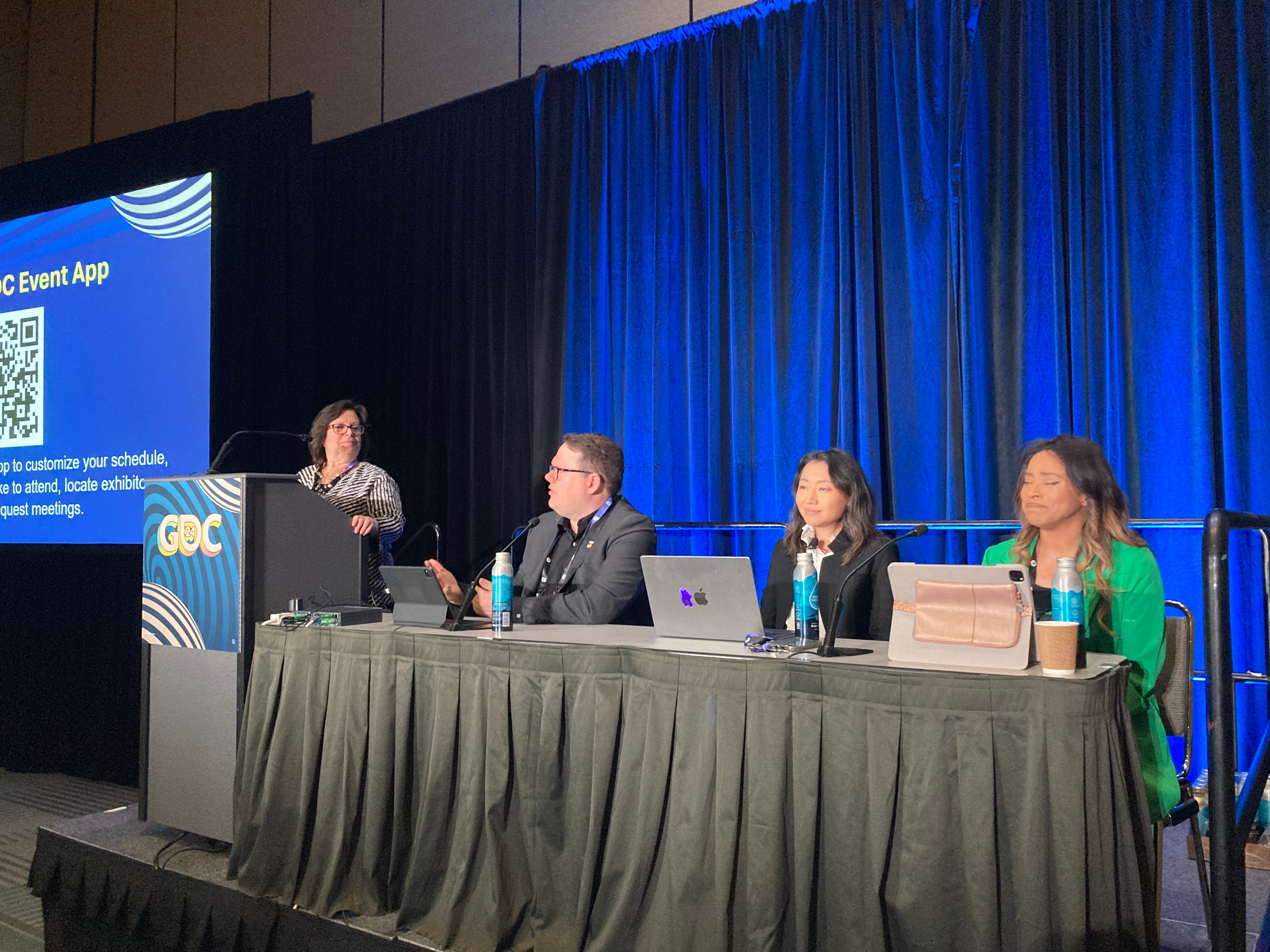 SAG-AFTRA national executive director Duncan Crabtree-Ireland, second from left, speaks on a panel at GDC