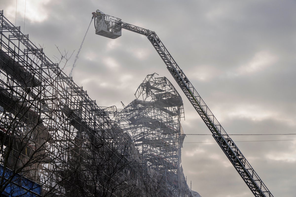 Copenhagen fights the last pockets of a fire that destroyed a 400-year-old landmark