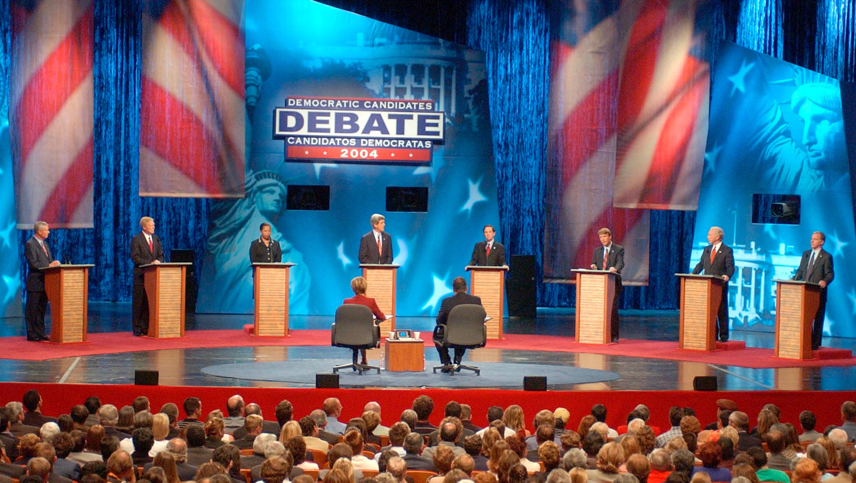 Bob Graham, on the left, participates in a Democratic primary debate in New Mexico on 4 September 2003