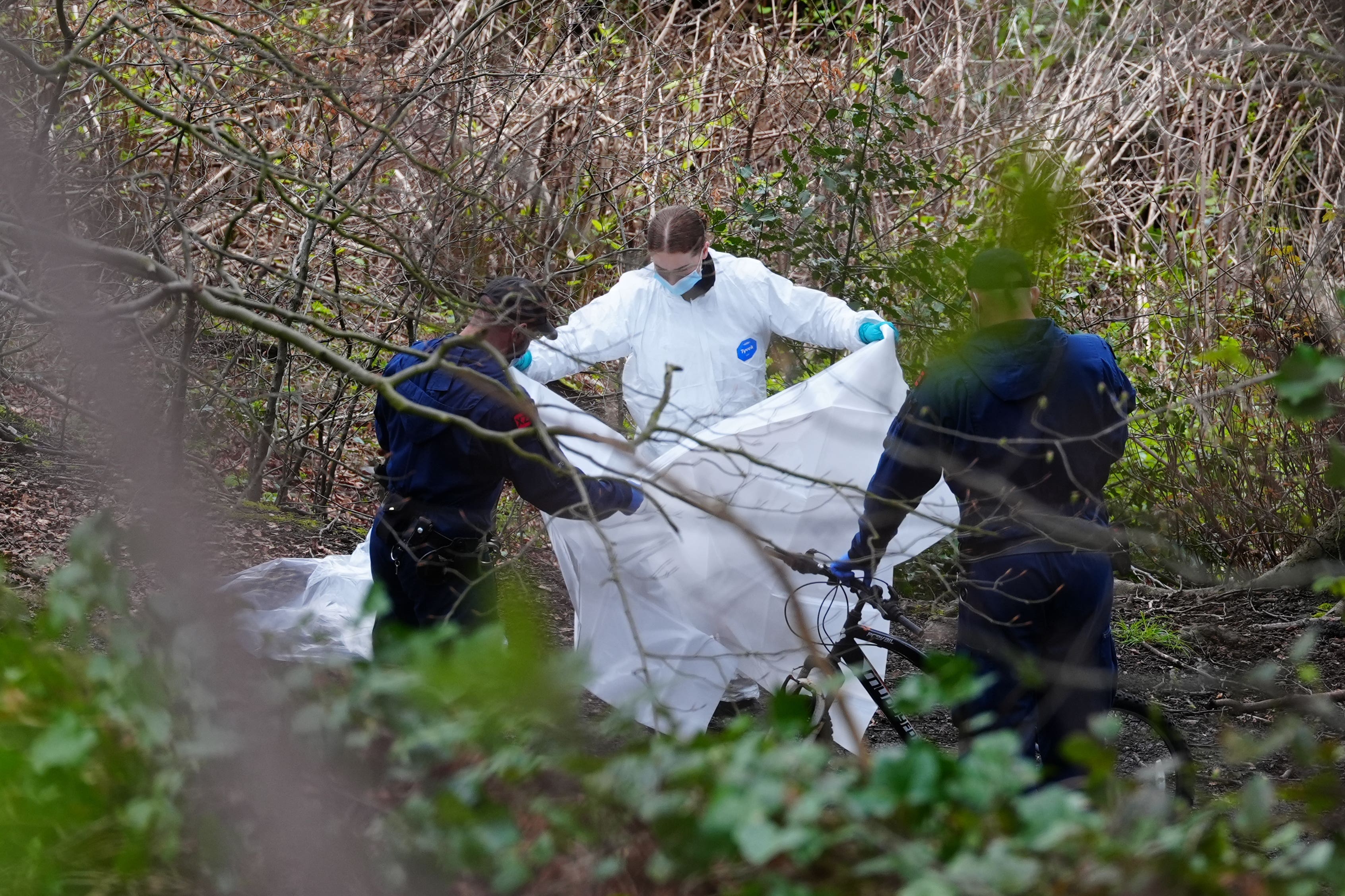 Police and forensic officers at Kersal Dale, near Salford, Greater Manchester (Peter Byrne/PA)