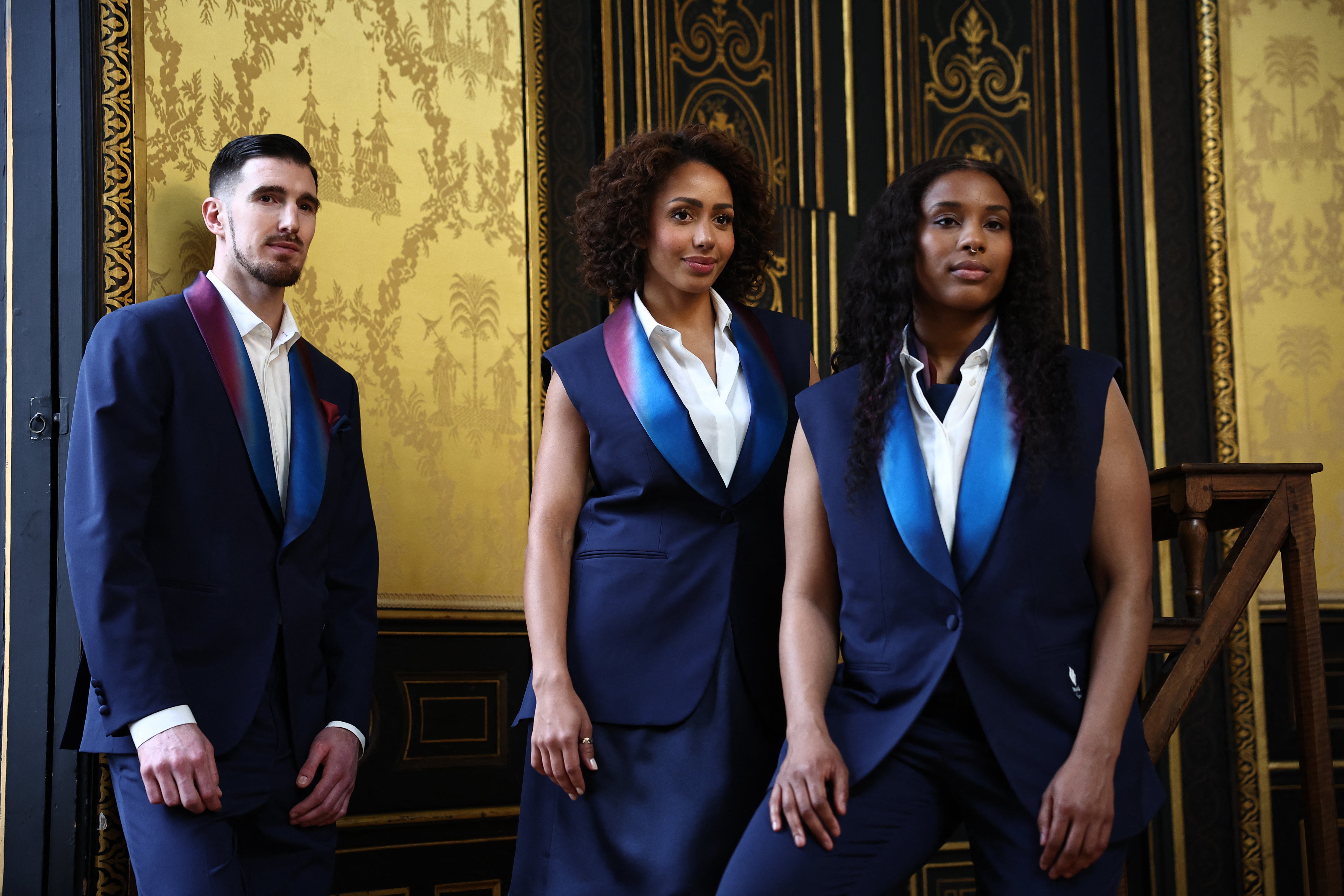 <p>Nando De Colo, Estelle Mossely and Gloria Agblemagnon wearing the official Berluti France Olympic opening ceremony outfits </p>