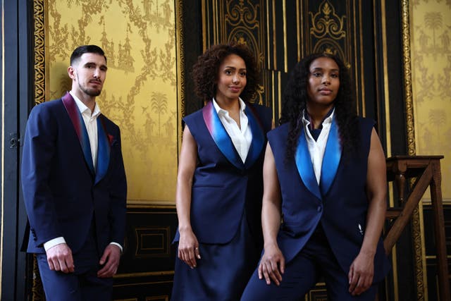 <p>Nando De Colo, Estelle Mossely and Gloria Agblemagnon wearing the official Berluti France Olympic opening ceremony outfits </p>