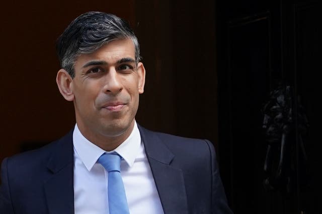 Prime Minister Rishi Sunak has set out an ambition to scrap national insurance contributions (Lucy North/PA)