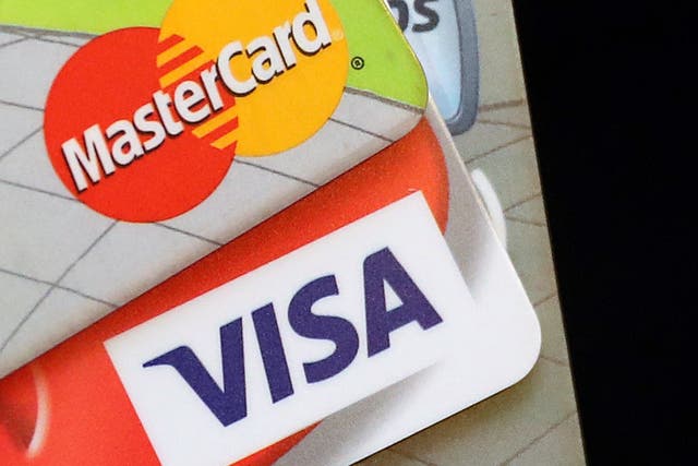 UK Finance said outstanding balances on credit card accounts increased by 9.4% over the 12 months to January (Andrew Matthews/PA)