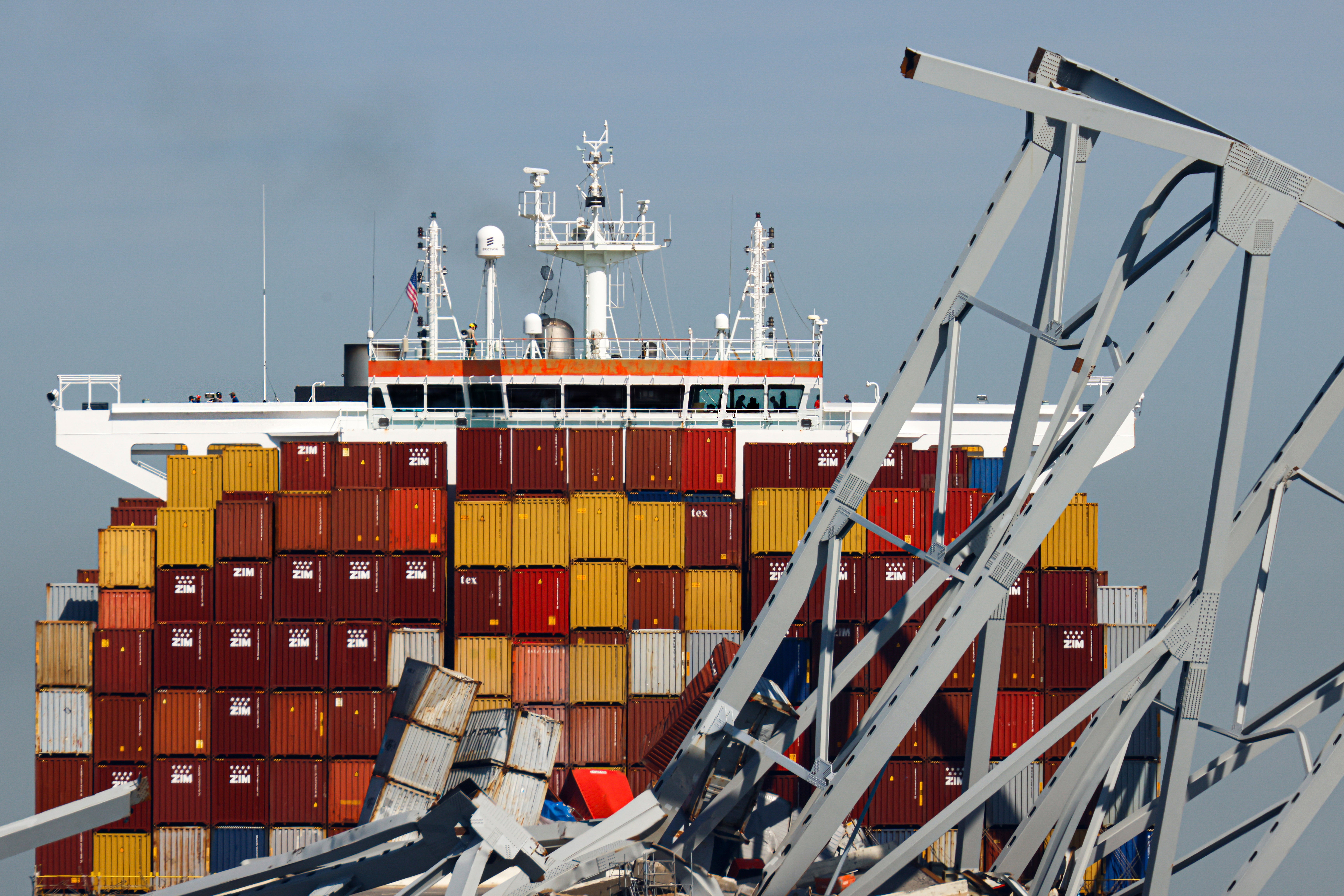 People are seen aboard the container ship Dali, Monday, April 15, 2024, in Baltimore