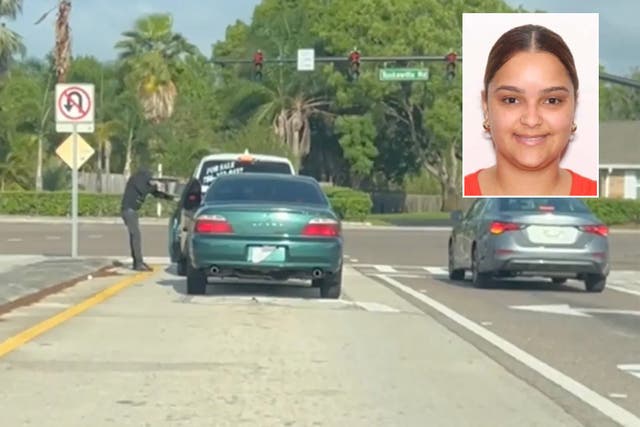 <p>Video footage from another driver shows a man armed with a gun  get out of a green Acura, approach Aguasvivas and drag her from the vehicle before forcing her back in and speeding off.  </p>