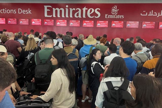 <p>Going places? The queue for service at an Emirates desk in Dubai airport </p>