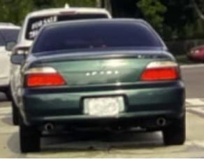 The green Acura has been linked to a murder that happened a day before the carjacking