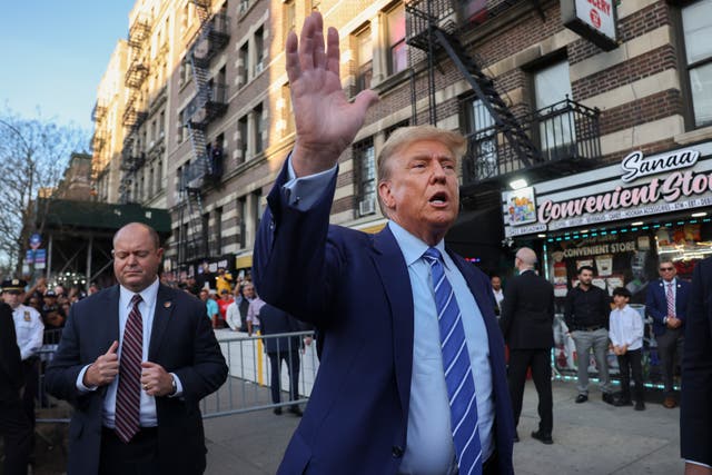 <p>Former president Donald Trump, talks to members of the media while visiting a bodega, after leaving court for his hush money trial on Tuesday 16 April 2024</p>