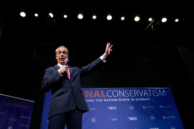 <p>Nigel Farage, honorary president of Reform UK and former MEP, at the National Conservatism conference in Brussels on Tuesday</p>
