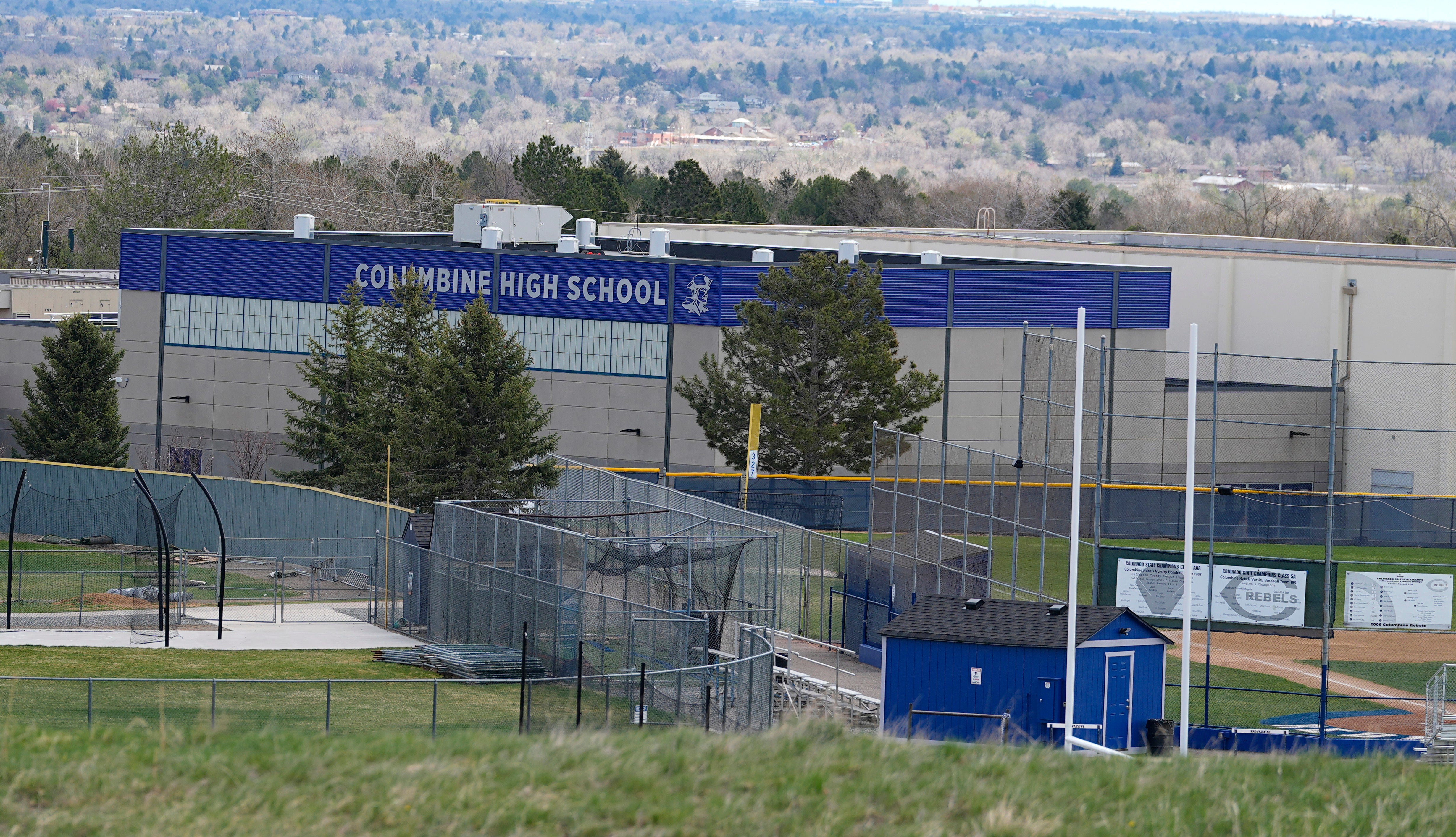 A view of Columbine High School from Rebel Hill at the Columbine Memorial, taken days before the 25th anniversary of the fatal attack