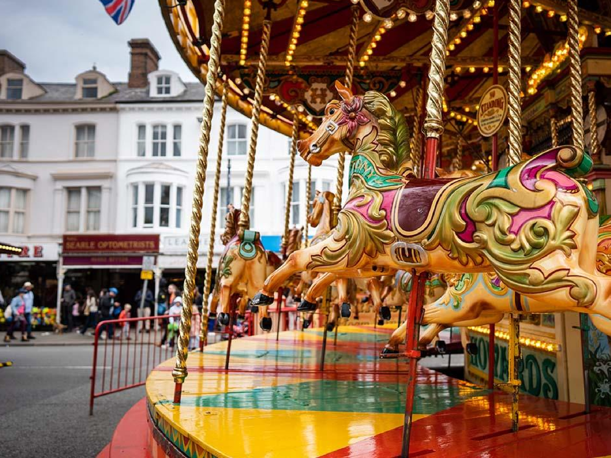 Traditional fair rides are part of the Victorian-themed weekend in the North Wales seaside town