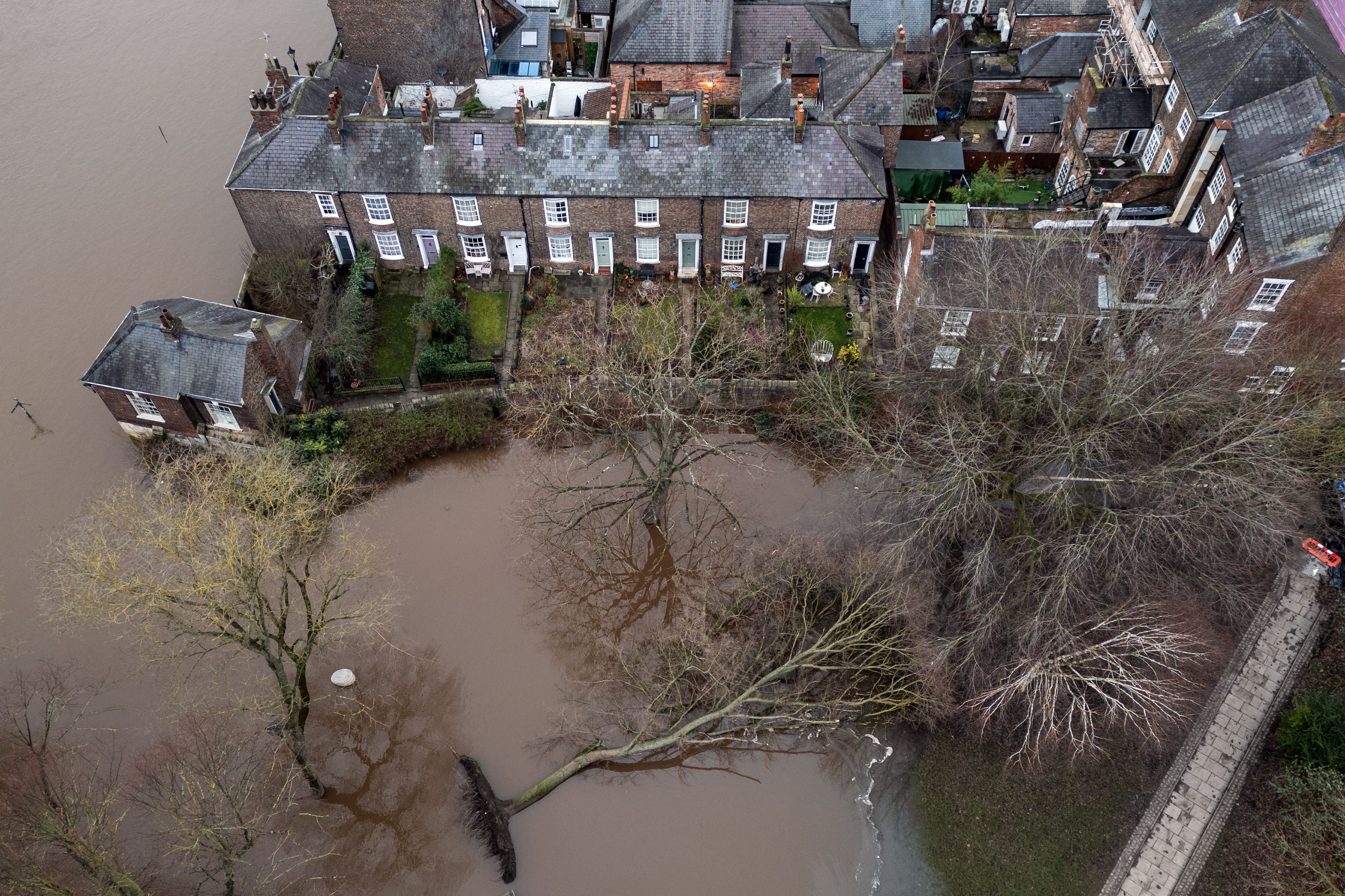 A fallen tree in floodwater in York following storms in January (Danny Lawson/PA)