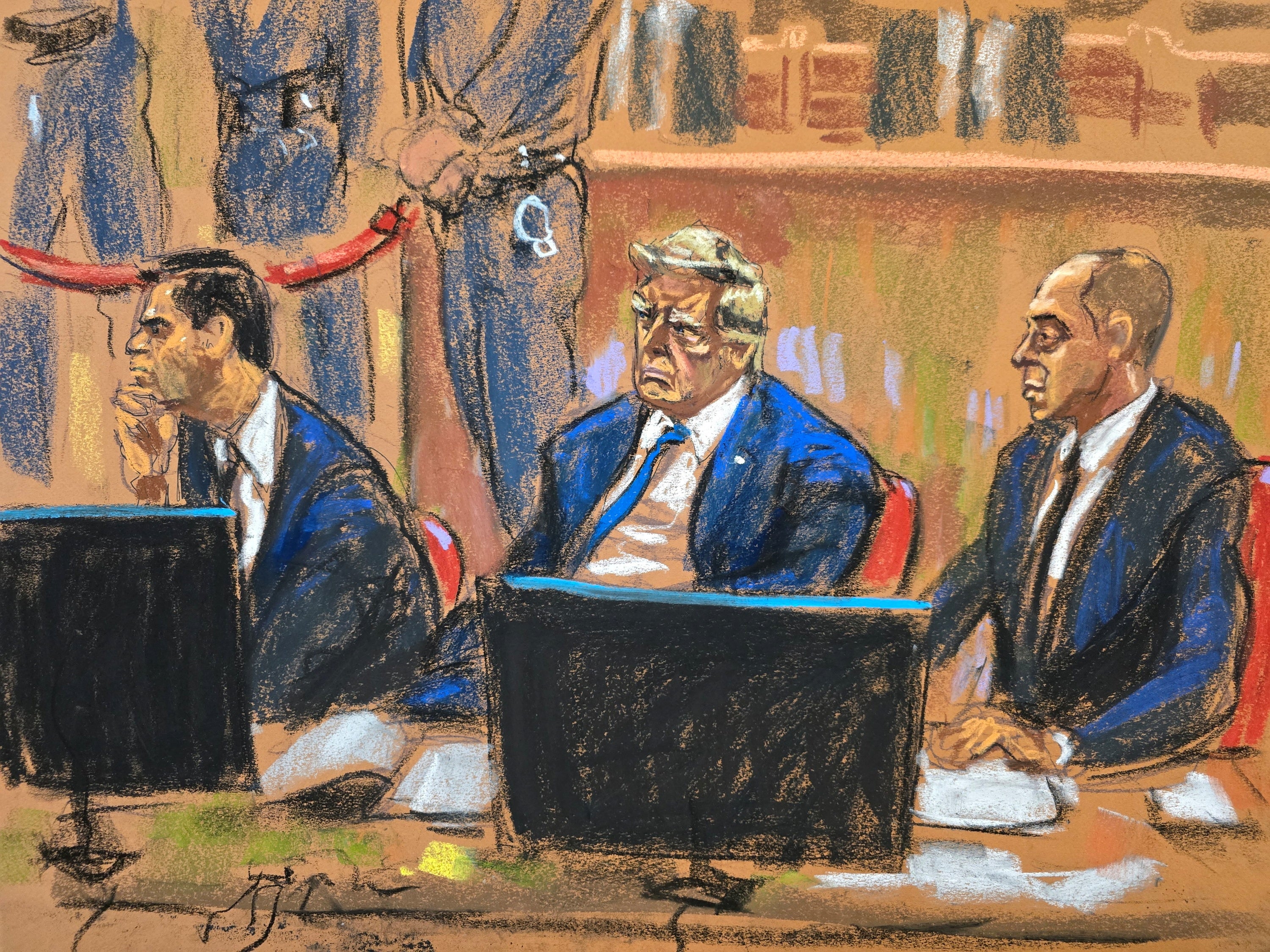 Donald Trump sits beside his lawyers Todd Blanche and Emil Bove during jury selection on Thursday