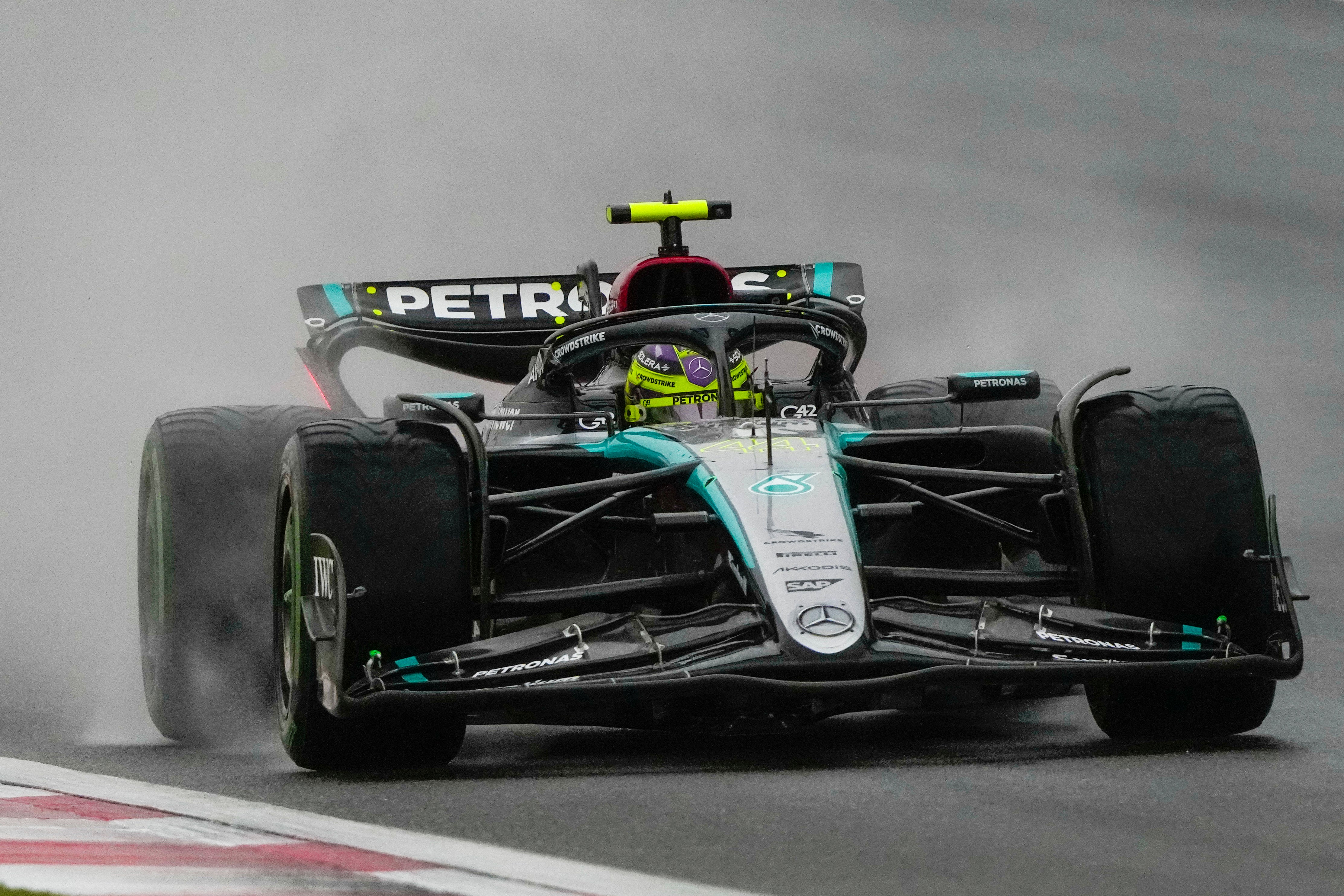 Lewis Hamilton took advantage of the rainy conditions to finish on the front row alongside Norris