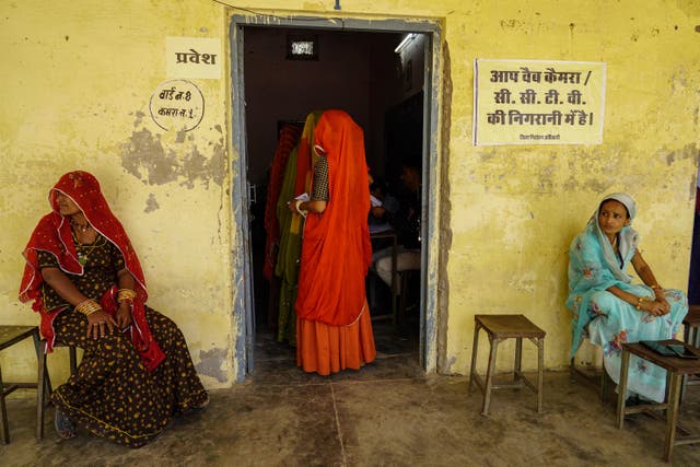 <p>Women queue up to vote in first phase of India’s general elections in Parbatsar, Rajasthan, on 19 April 2024</p>