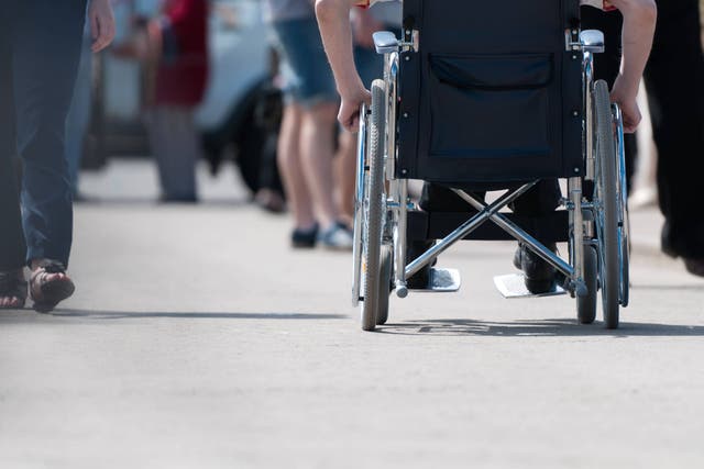 <p>Removing a scheme to help disabled people into jobs, in the middle of a crusade to get Britain working again, is ‘adding injury to injury’ Alamy/PA</p>
