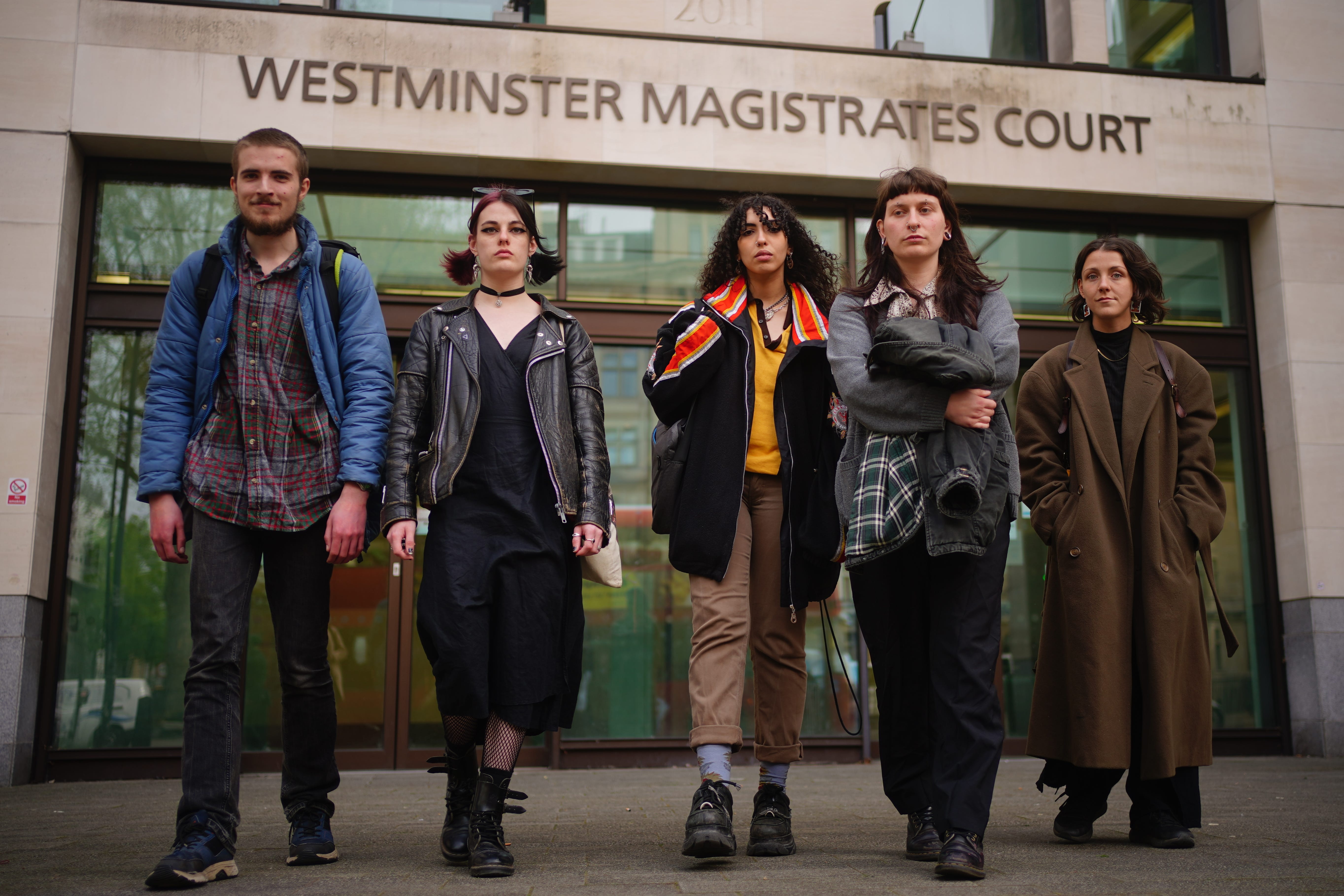 The five activists climbed on stage at the Sondheim Theatre and locked themselves to the set (Victoria Jones/PA)