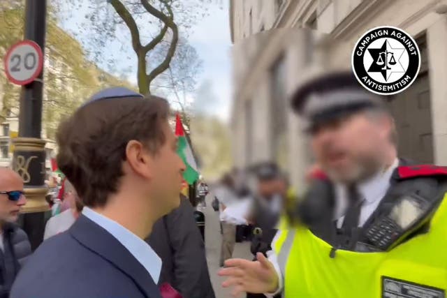 <p>Screengrab from video shared by Campaign Against Antisemitism of their chief executive Gideon Falter speaking to Metropolitan Police during a pro-Palestine march in London (Campaign Against Antisemitism/PA)</p>
