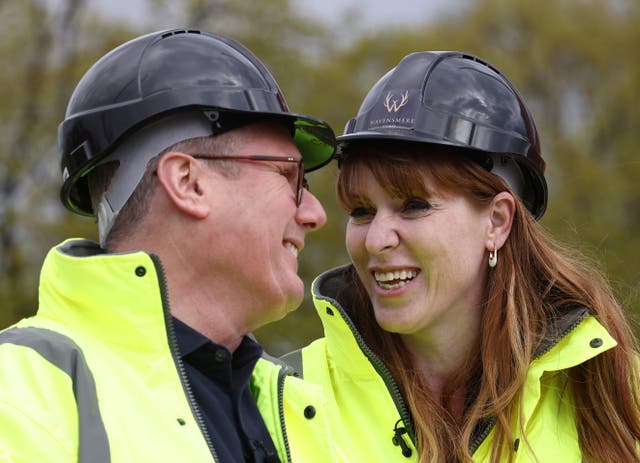 <p>Labour Leader Keir Starmer (L) and Deputy Leader Angela Rayner speak during a visit to the Nightingale Quarter on April 19, 2024 in Derby, England</p>